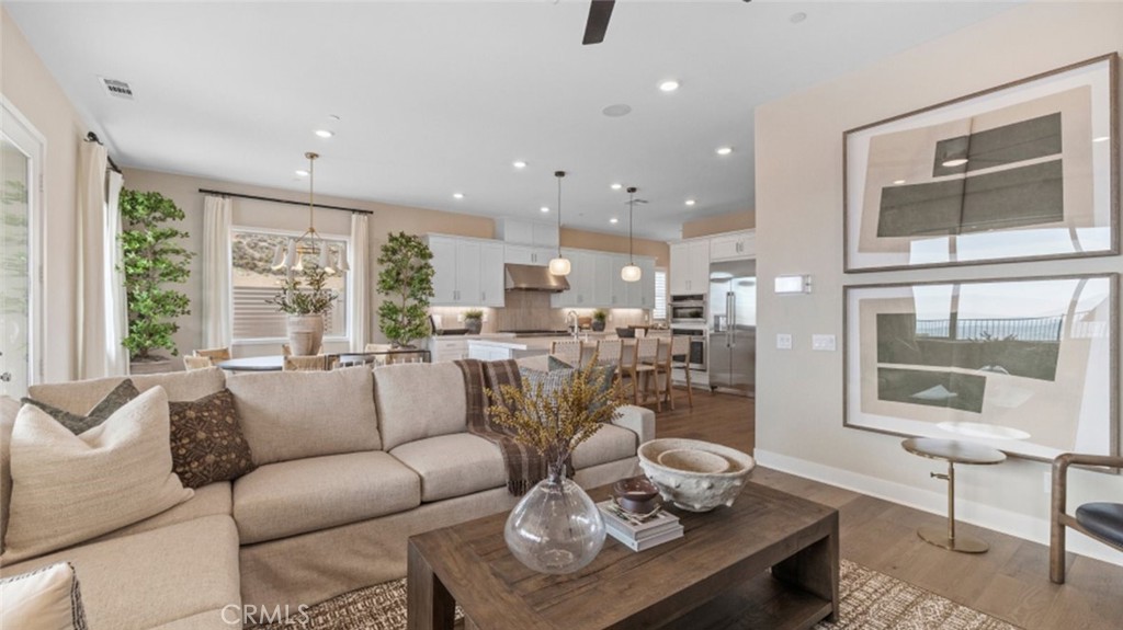 29503 Corte Azulejo Valencia, CA 91354 - Photo 11 of 34 a living room with furniture and a large window