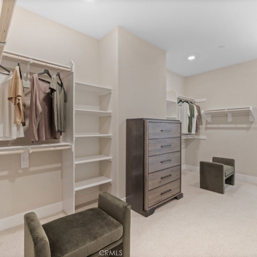 29503 Corte Azulejo Valencia, CA 91354 - Photo 20 of 34 a room with furniture and a chair