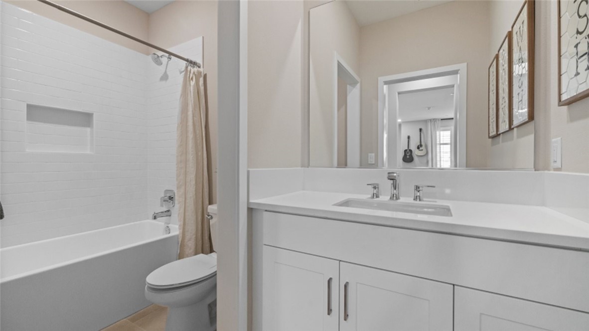 29503 Corte Azulejo Valencia, CA 91354 - Photo 27 of 34 a bathroom with a sink toilet and shower