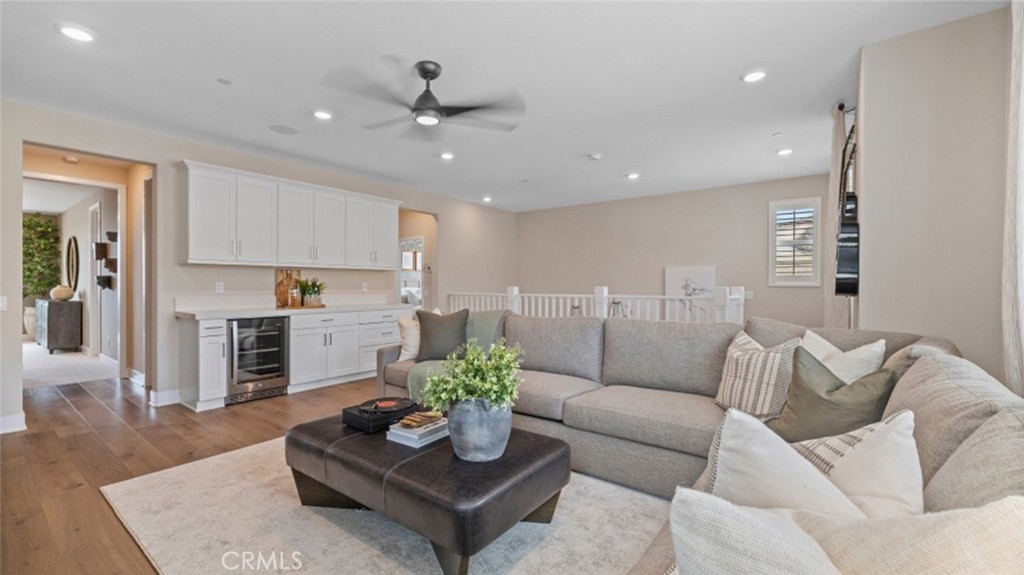 29503 Corte Azulejo Valencia, CA 91354 - Photo 28 of 34 a living room with furniture kitchen and a chandelier