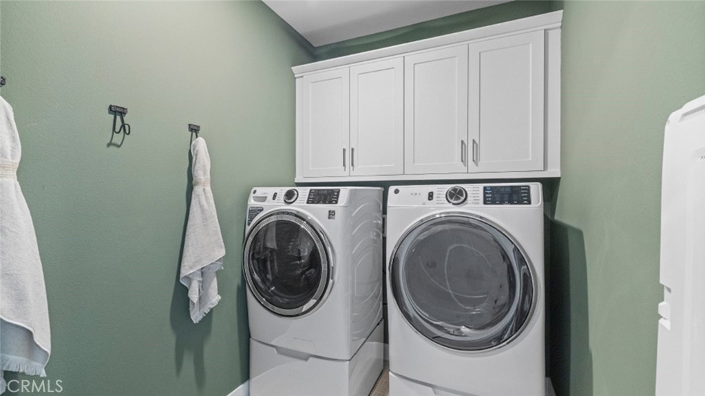 29503 Corte Azulejo Valencia, CA 91354 - Photo 29 of 34 a utility room with dryer and washer