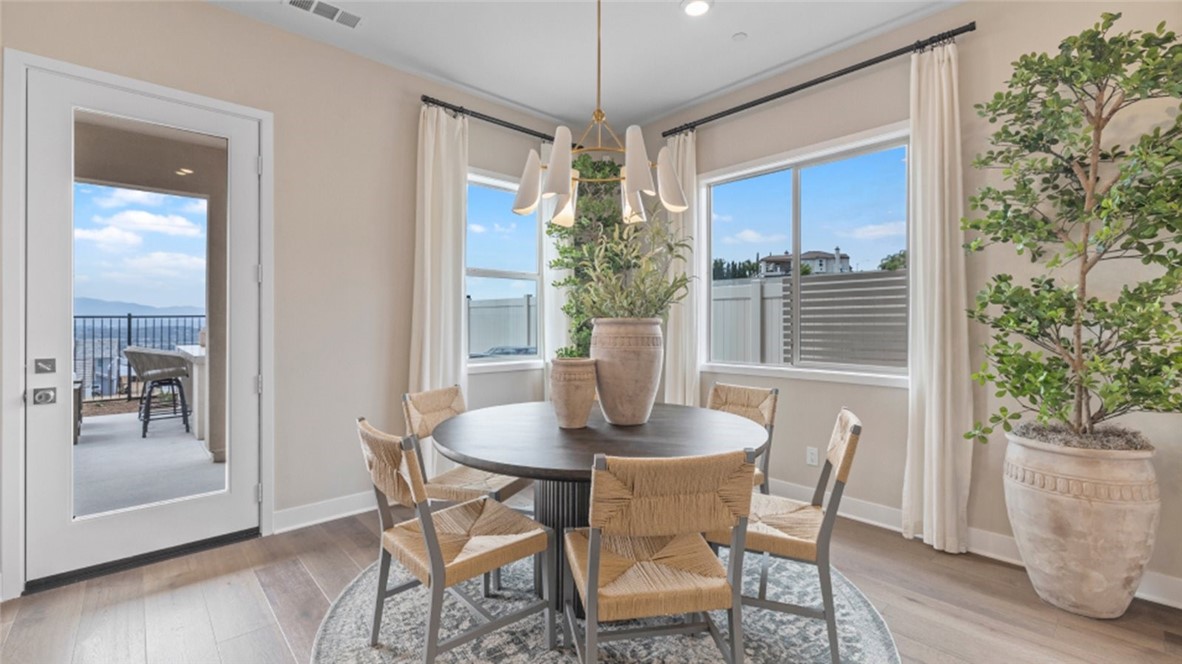 29503 Corte Azulejo Valencia, CA 91354 - Photo 8 of 34 a dining room with furniture and window