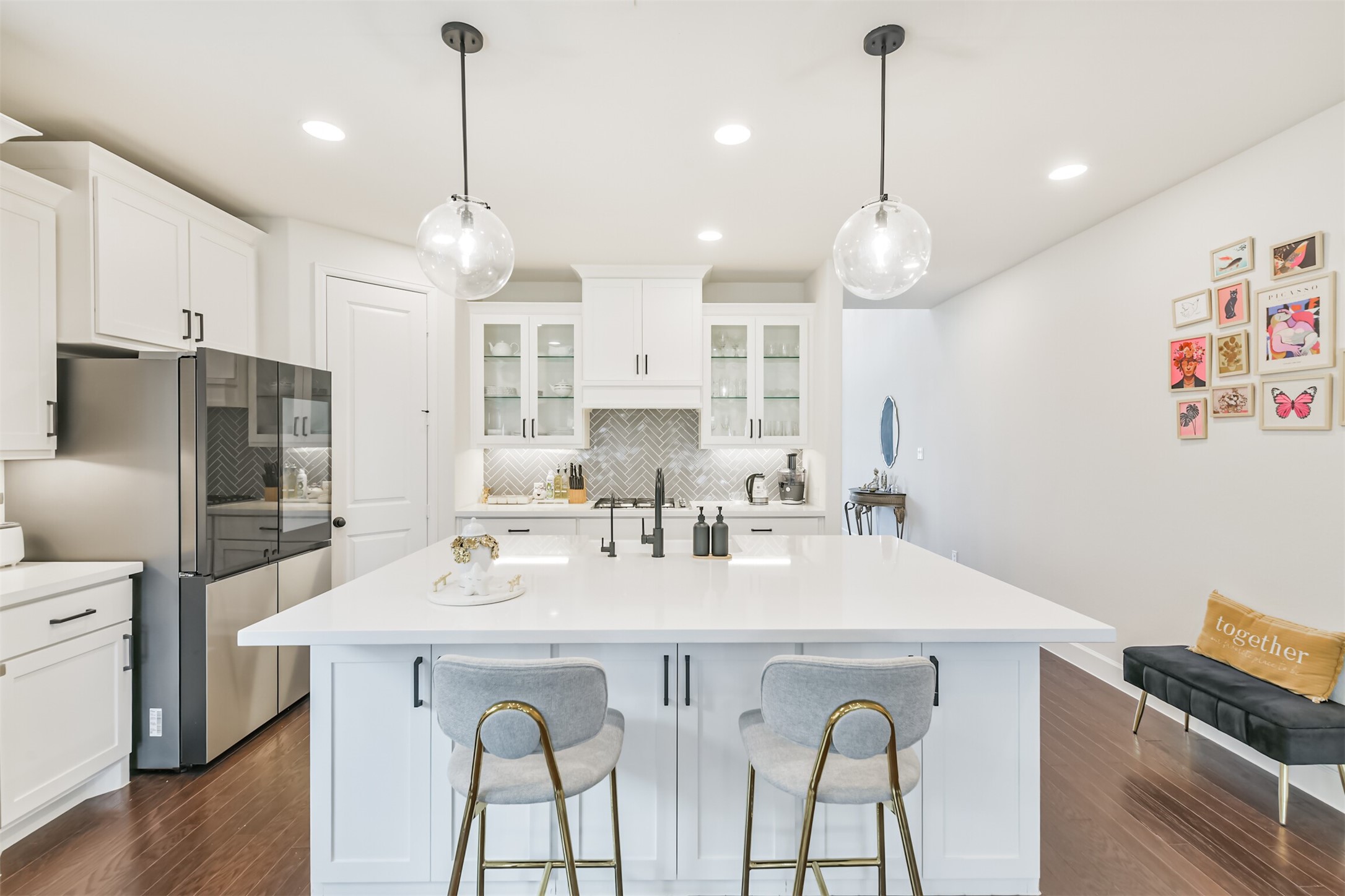 19319 Wild Sabino Way Tomball, TX 77377 - Photo 15 of 46 a large kitchen with a table and chairs