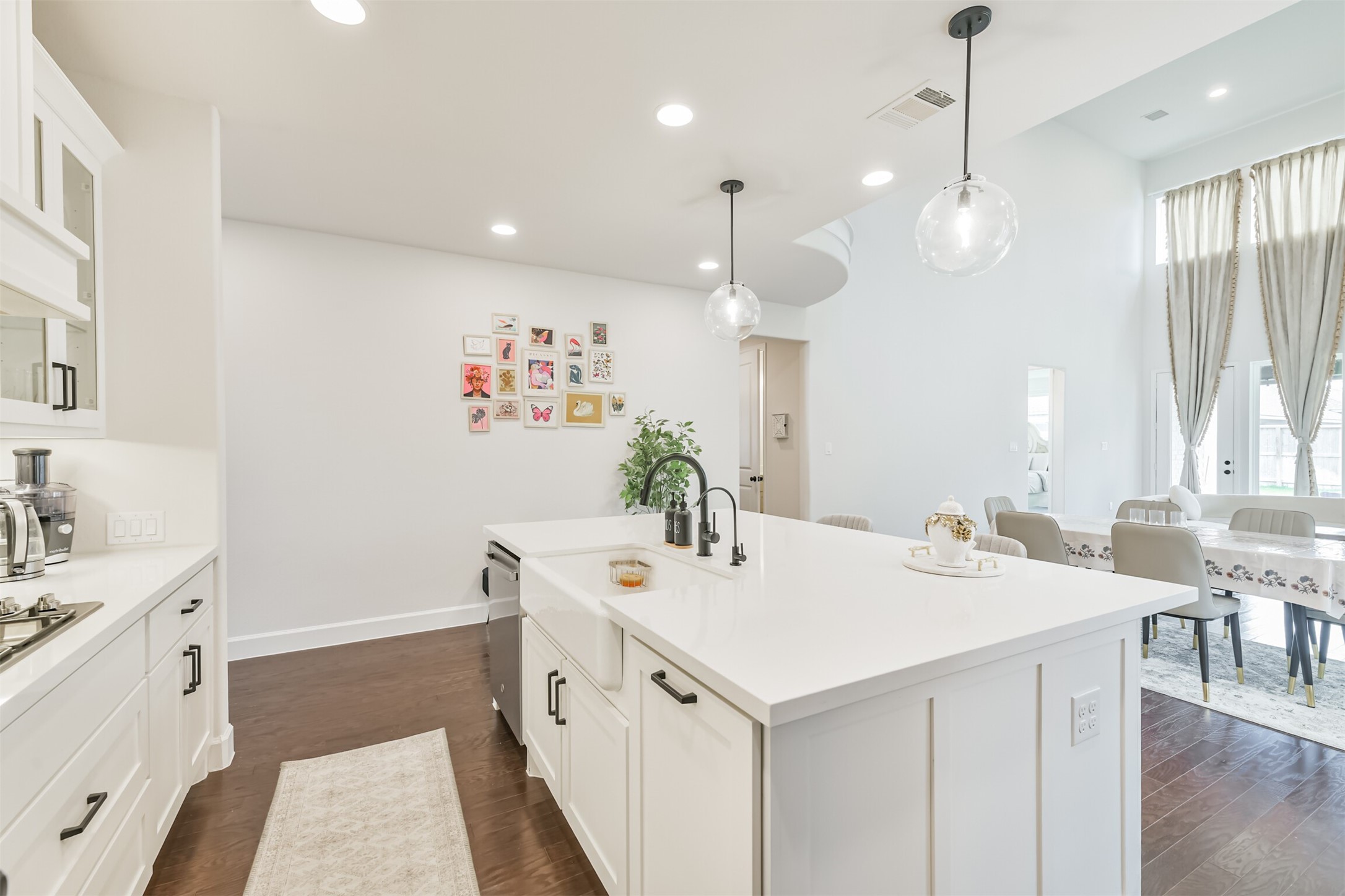 19319 Wild Sabino Way Tomball, TX 77377 - Photo 16 of 46 a spacious bathroom with a sink a large mirror and a shower