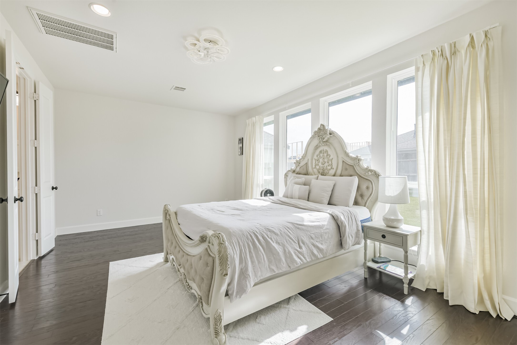 19319 Wild Sabino Way Tomball, TX 77377 - Photo 20 of 46 a bedroom with a bed and a window