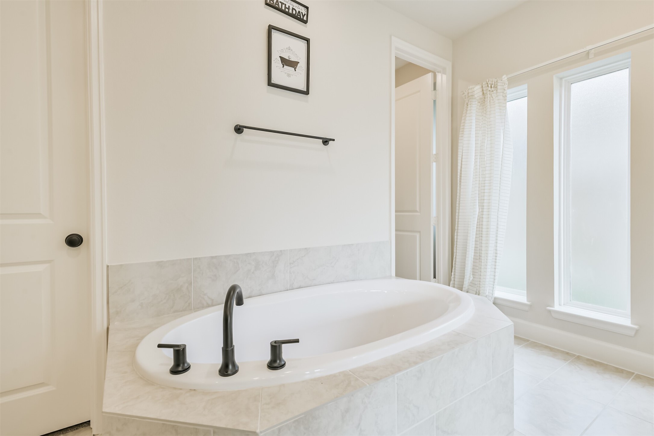 19319 Wild Sabino Way Tomball, TX 77377 - Photo 25 of 46 a bathroom with a sink