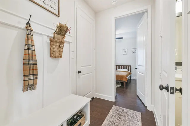 a bathroom with a sink vanity and a mirror