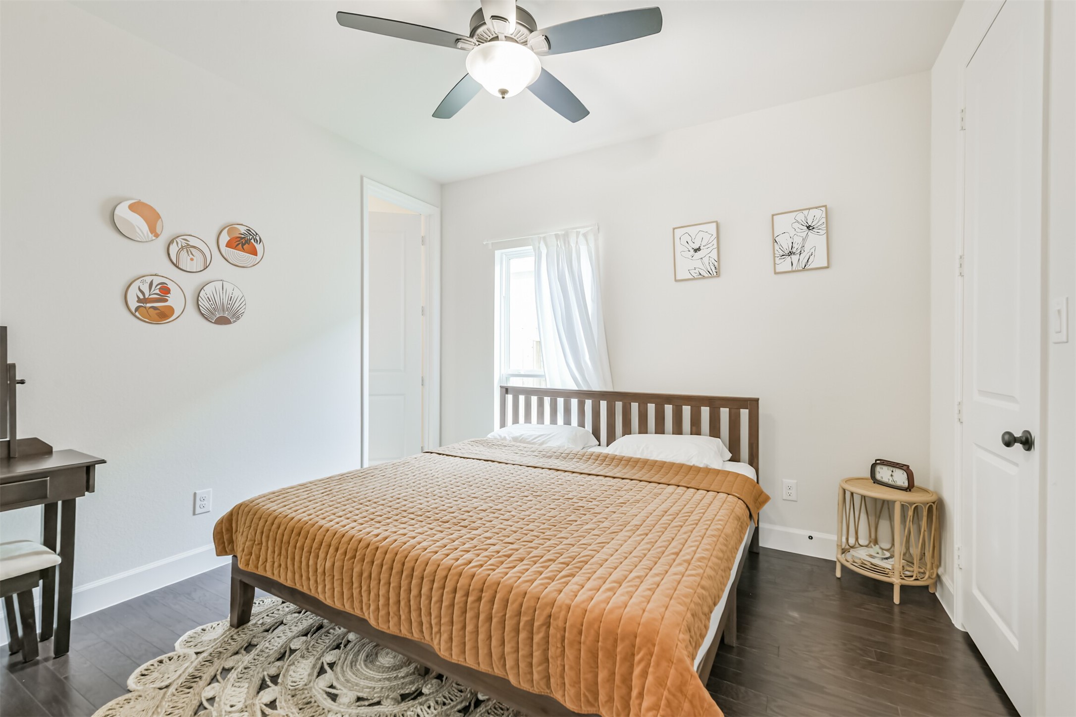 19319 Wild Sabino Way Tomball, TX 77377 - Photo 28 of 46 a bedroom with a bed and a window