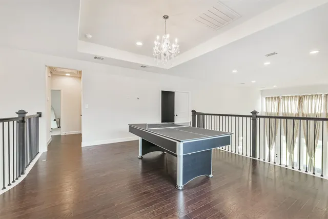 a view of kitchen with cabinets and wooden floor