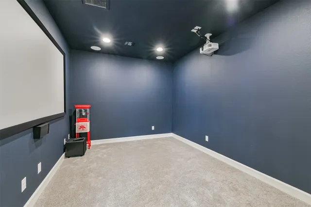 a view of a livingroom with a kitchen