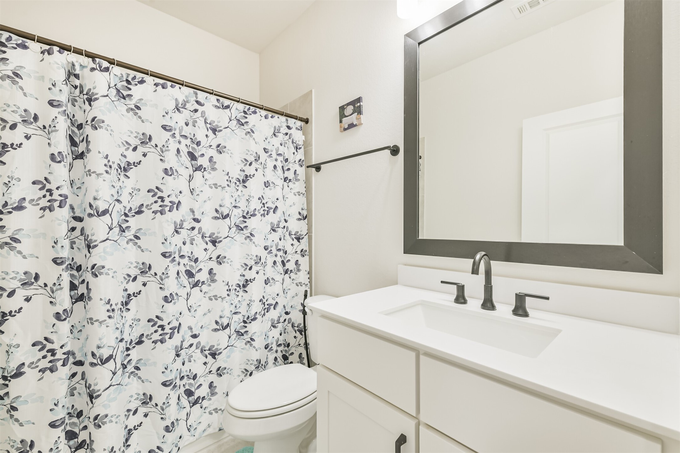 19319 Wild Sabino Way Tomball, TX 77377 - Photo 39 of 46 a bathroom with a sink toilet and shower