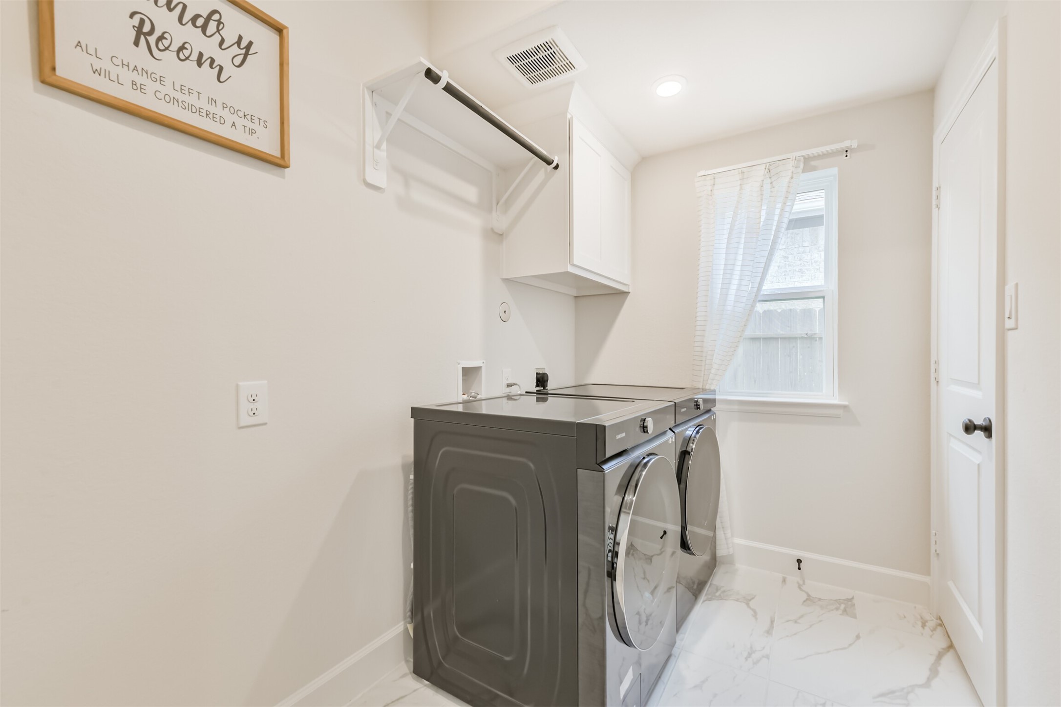 19319 Wild Sabino Way Tomball, TX 77377 - Photo 42 of 46 a utility room with cabinets washer and dryer