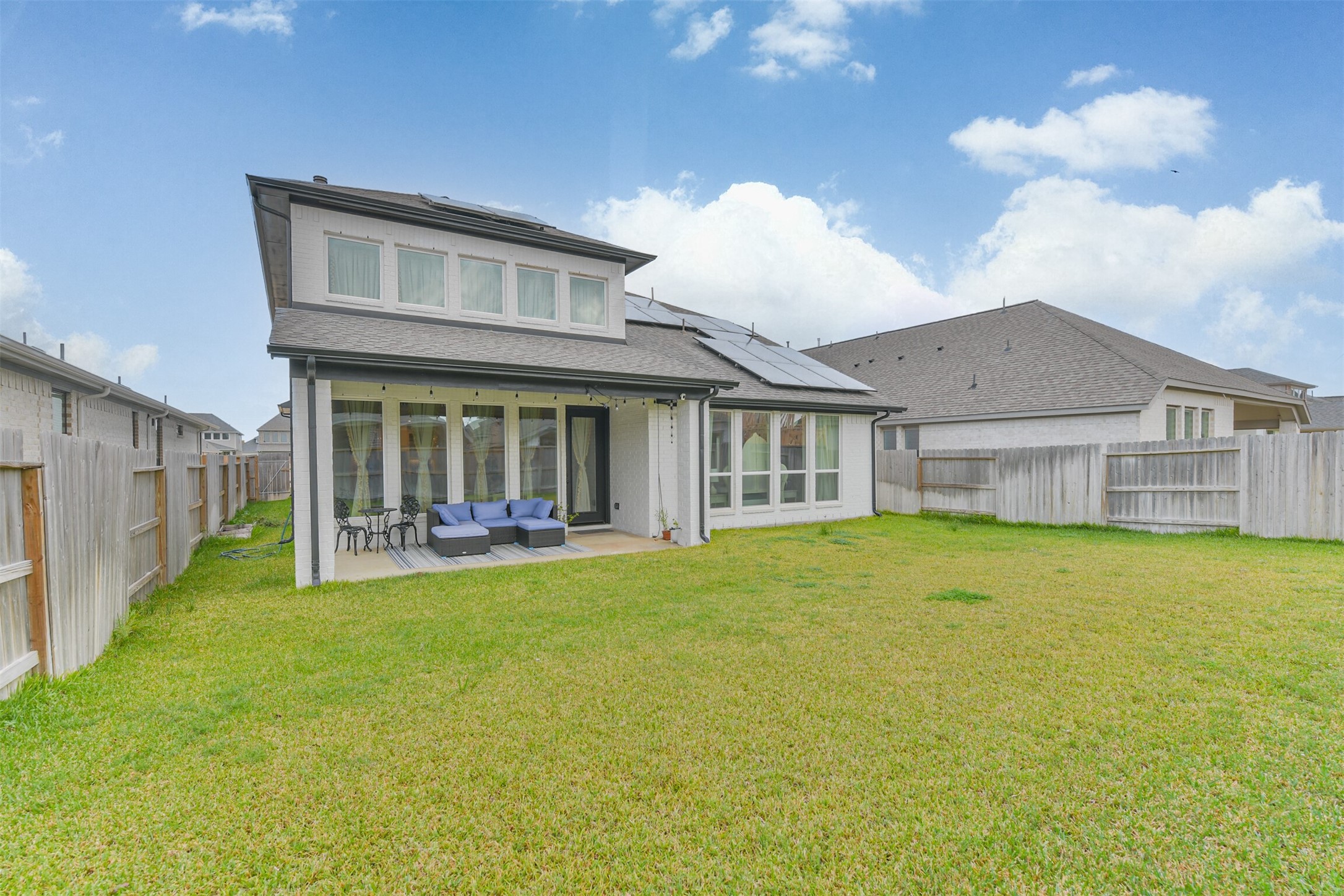 19319 Wild Sabino Way Tomball, TX 77377 - Photo 46 of 46 a view of a house with a swimming pool and a yard