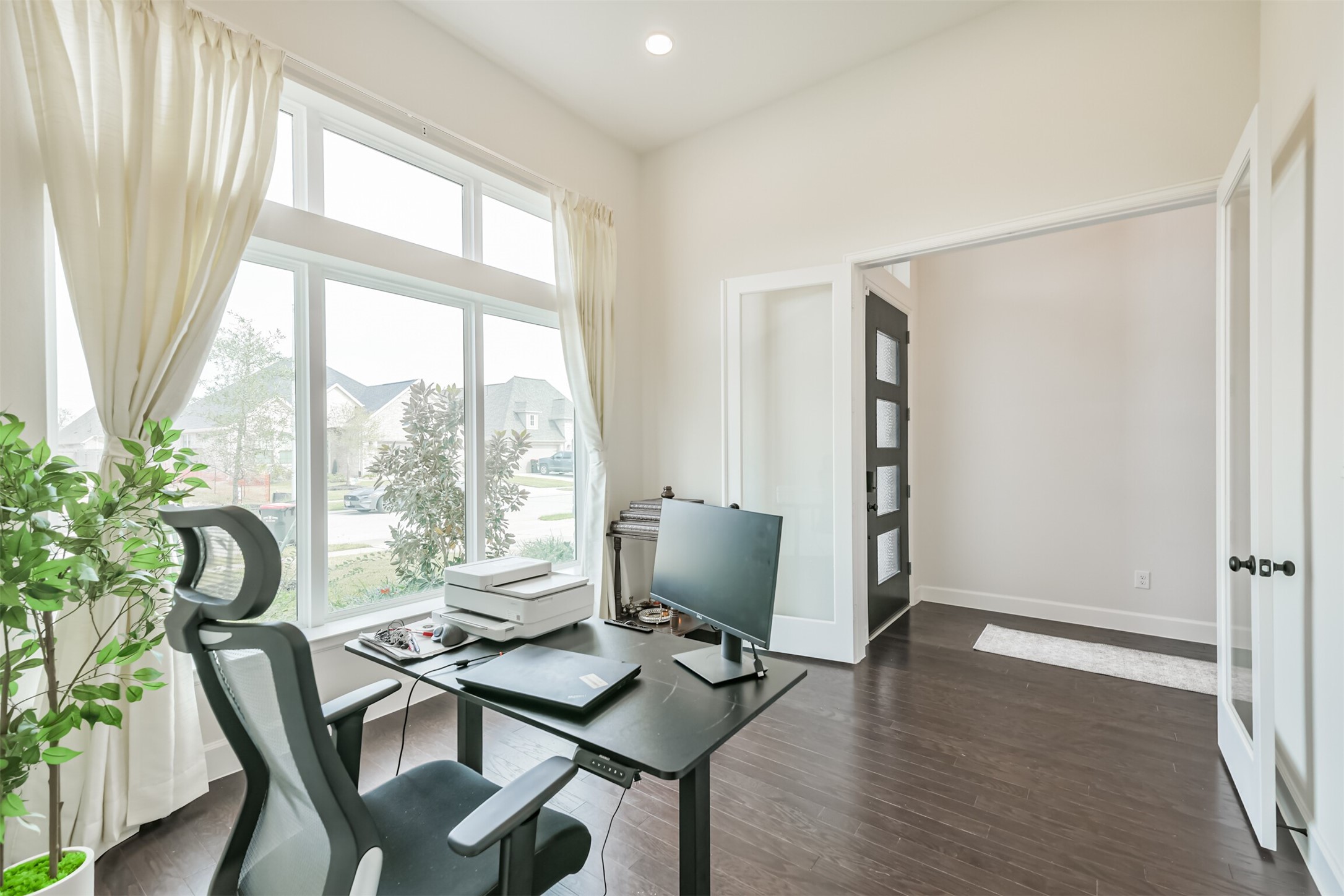 19319 Wild Sabino Way Tomball, TX 77377 - Photo 6 of 46 a workspace with furniture and a potted plant