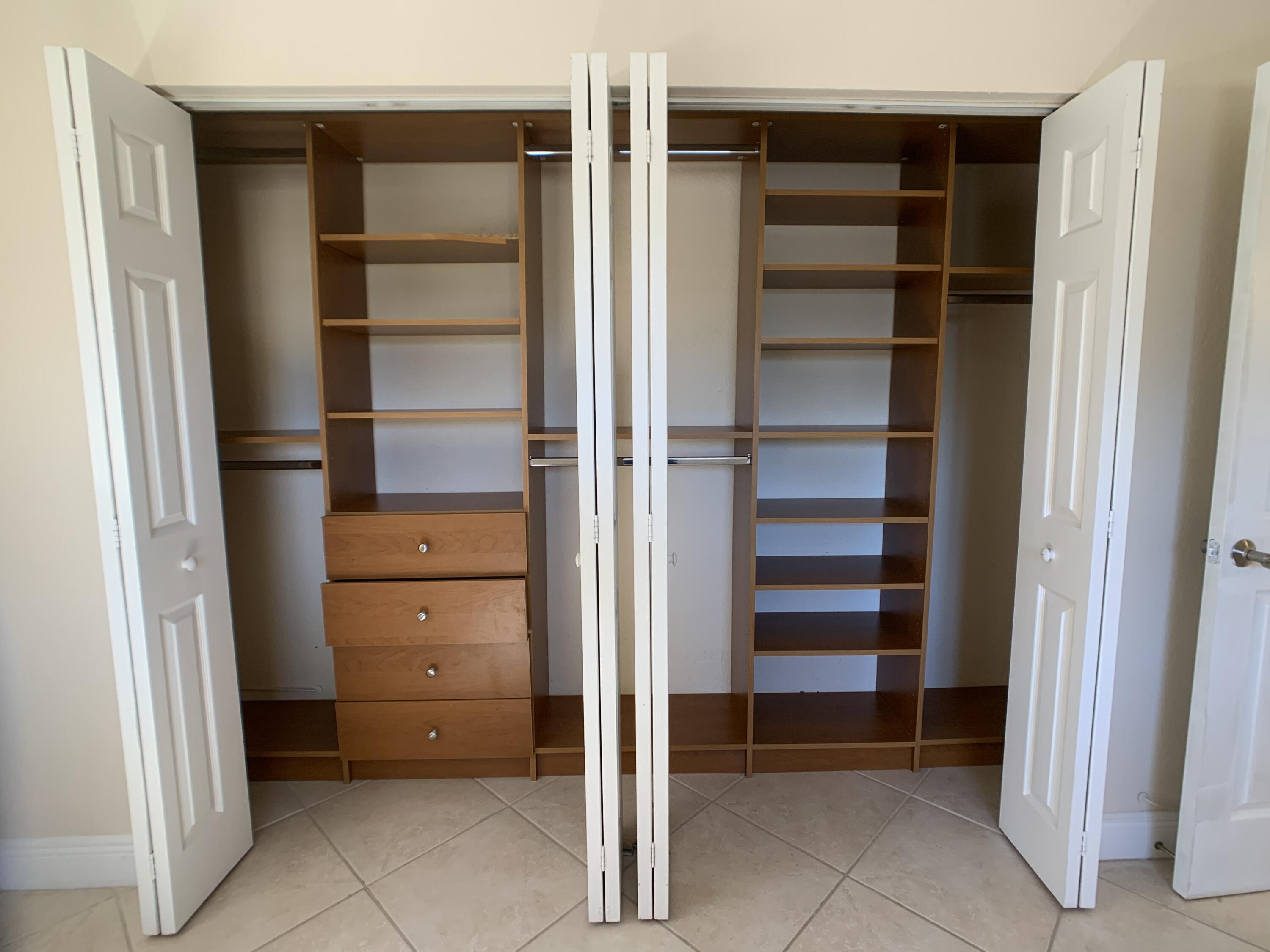 8601 Southwest 94th Street, Unit 201W Miami, FL 33156 - Photo 8 of 14 a view of an empty walk in closet