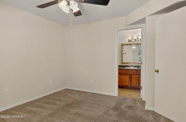 an empty room with a bathroom