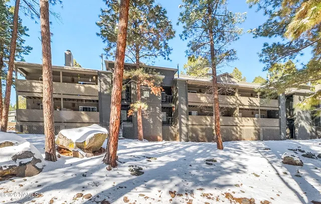 a view of a chairs on the side of street