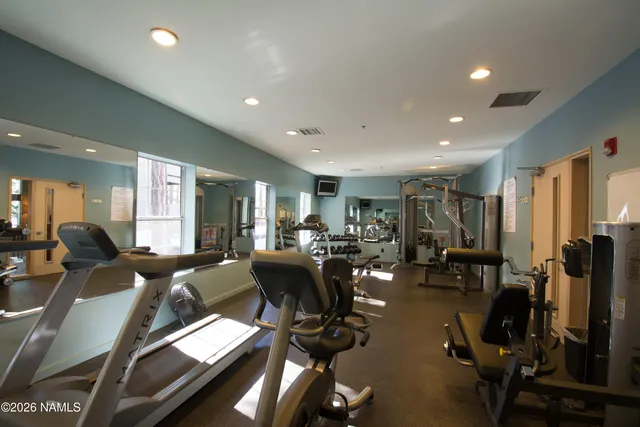 a view of a room with gym equipment