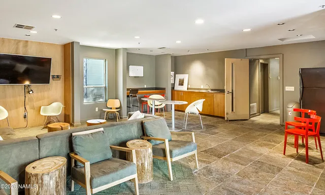 a view of a dining room with furniture