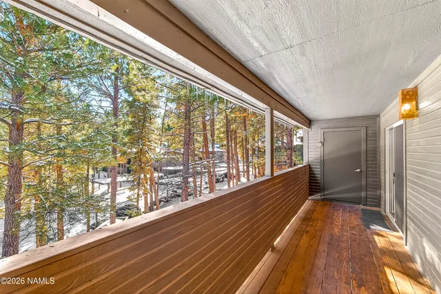 a view of railway station with wooden floor