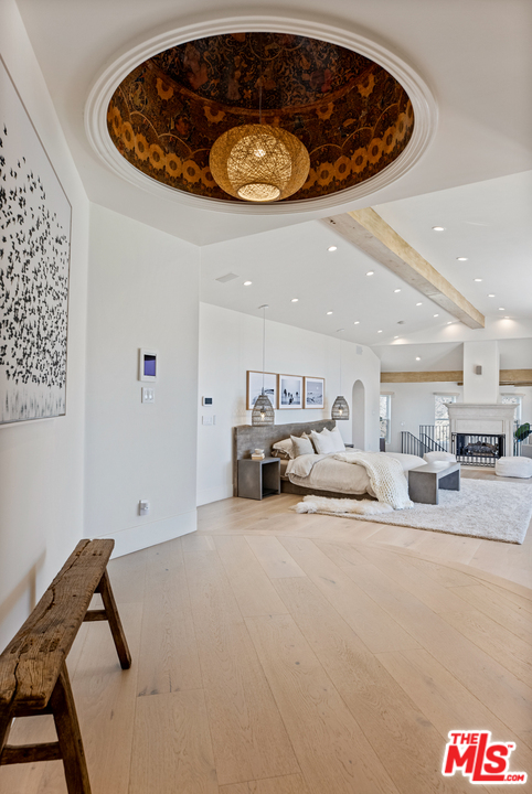 5868 Zumirez Drive Malibu, CA 90265 - Photo 32 of 54 a living room with furniture and a rug