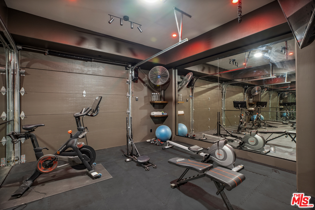 5868 Zumirez Drive Malibu, CA 90265 - Photo 42 of 54 a view of a room with gym equipment