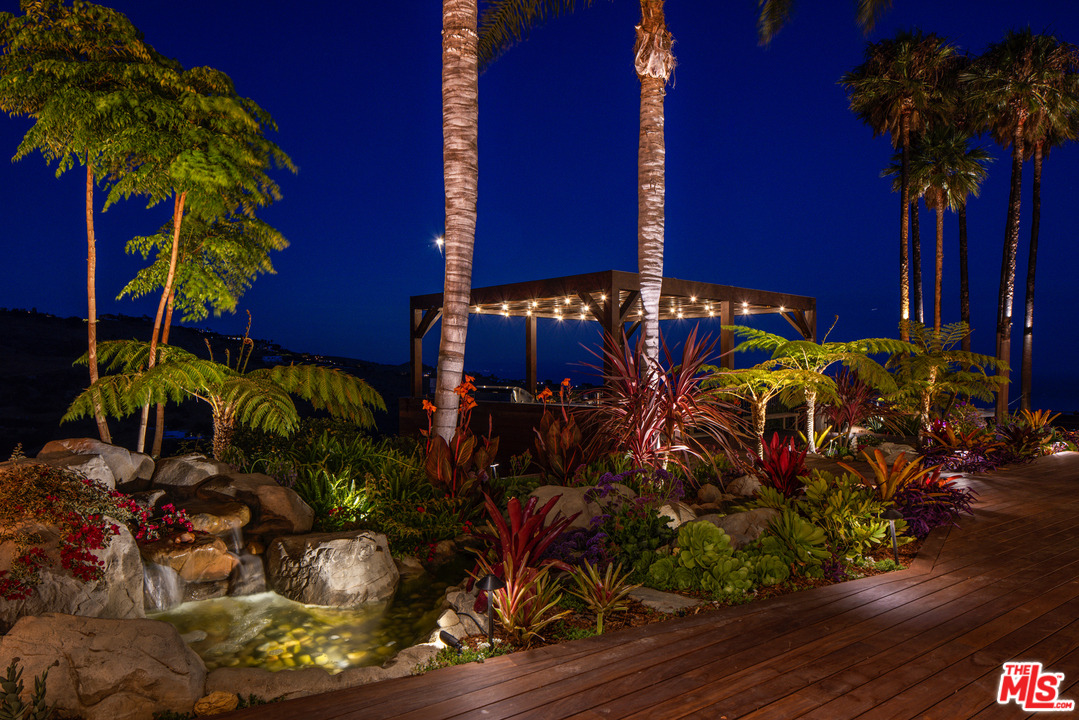 5868 Zumirez Drive Malibu, CA 90265 - Photo 52 of 54 front view of a potted plants