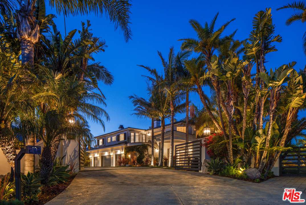 5868 Zumirez Drive Malibu, CA 90265 - Photo 54 of 54 a view of a palm trees front of house