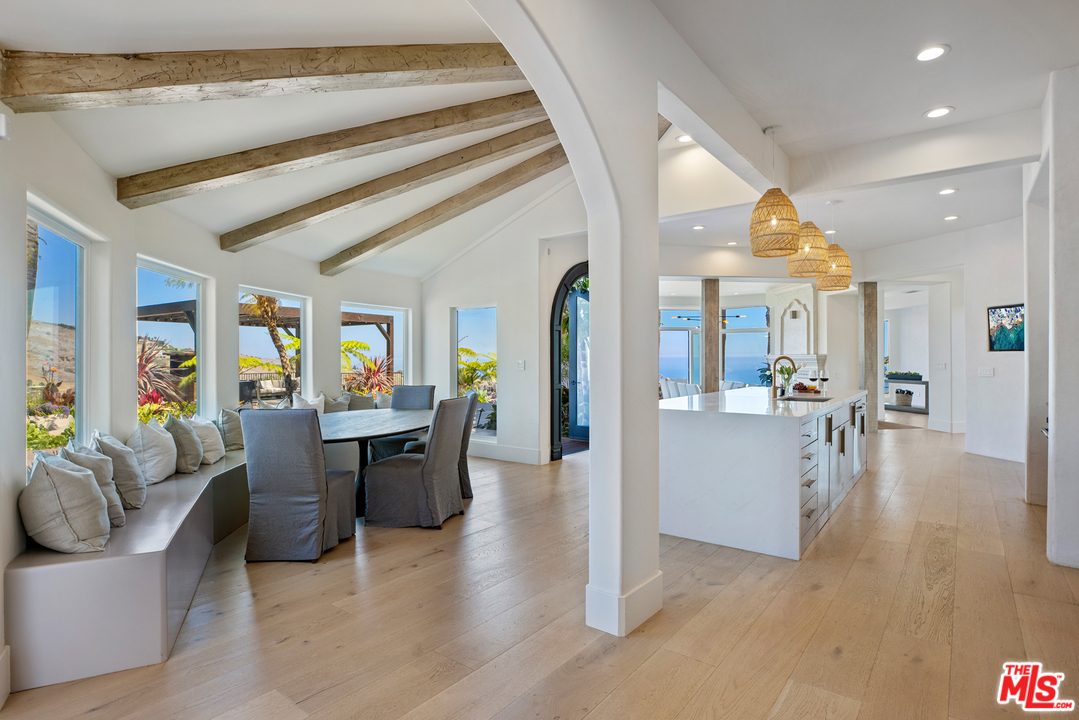 5868 Zumirez Drive Malibu, CA 90265 - Photo 9 of 54 a lobby with furniture and wooden floor