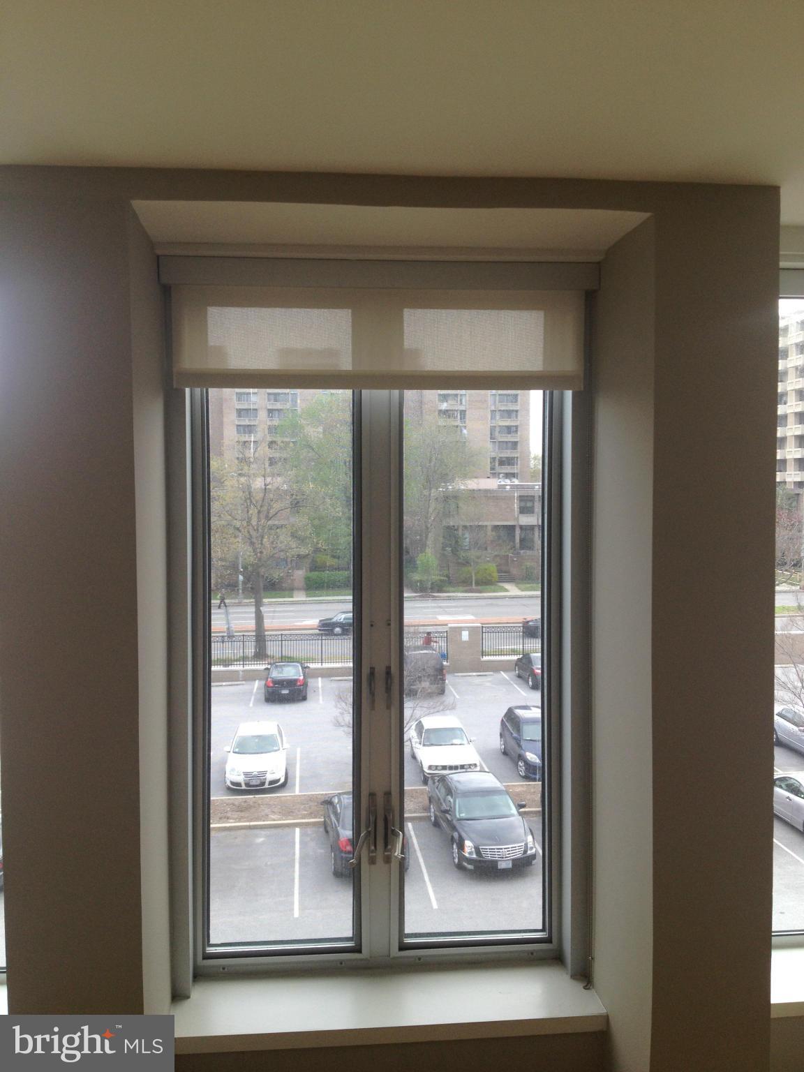 1101 3rd Street Southwest, Unit 210 Washington, DC 20024 - Photo 14 of 28 a view of a glass door and a window