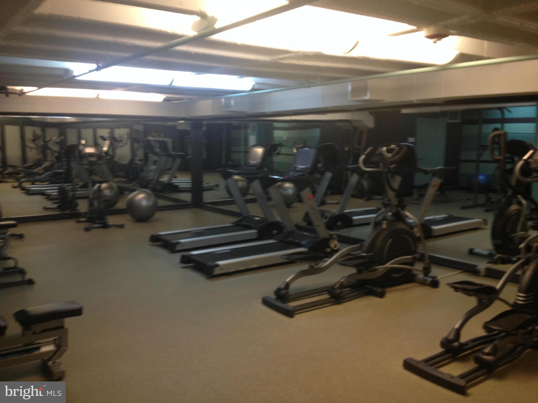 1101 3rd Street Southwest, Unit 210 Washington, DC 20024 - Photo 21 of 28 a gym room with gym equipment