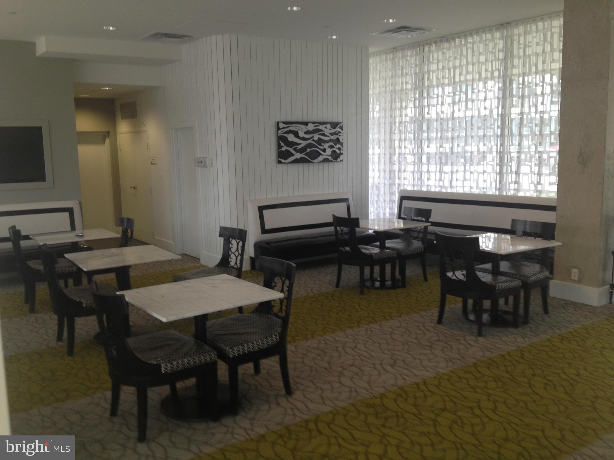 1101 3rd Street Southwest, Unit 210 Washington, DC 20024 - Photo 22 of 28 a view of a dining room with furniture