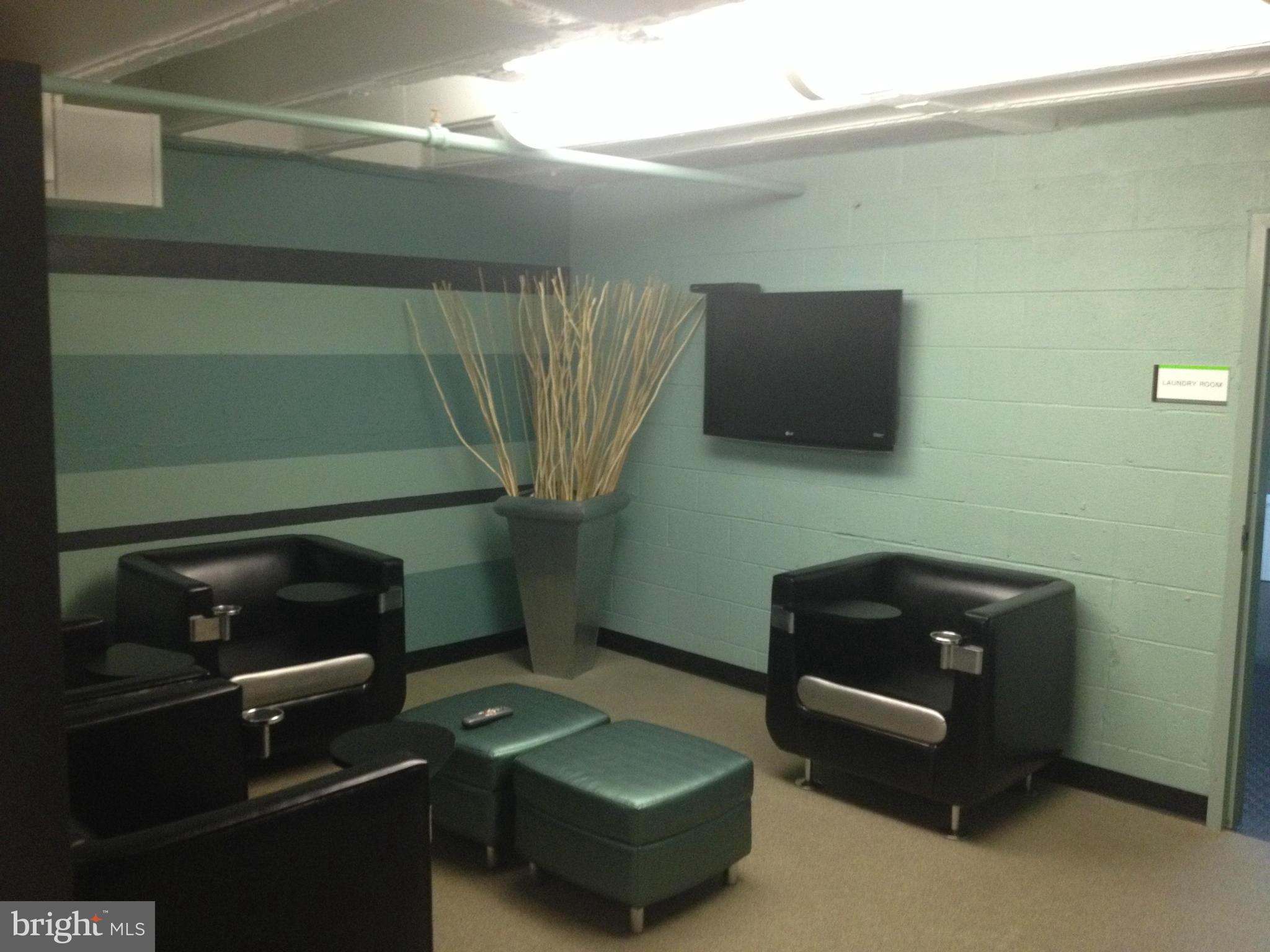 1101 3rd Street Southwest, Unit 210 Washington, DC 20024 - Photo 25 of 28 a room with furniture and a air conditioner vent
