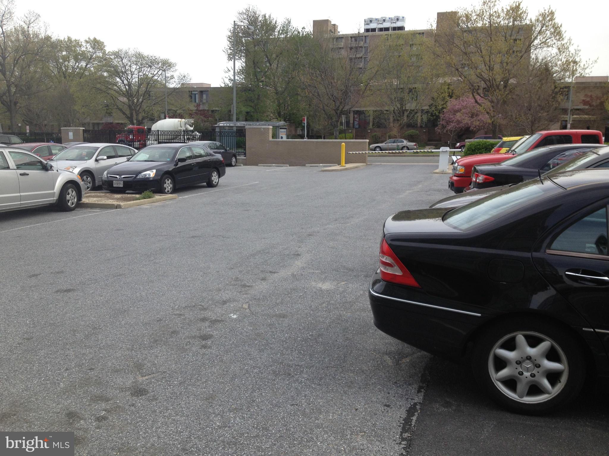 1101 3rd Street Southwest, Unit 210 Washington, DC 20024 - Photo 27 of 28 a view of a car parked in back of a house