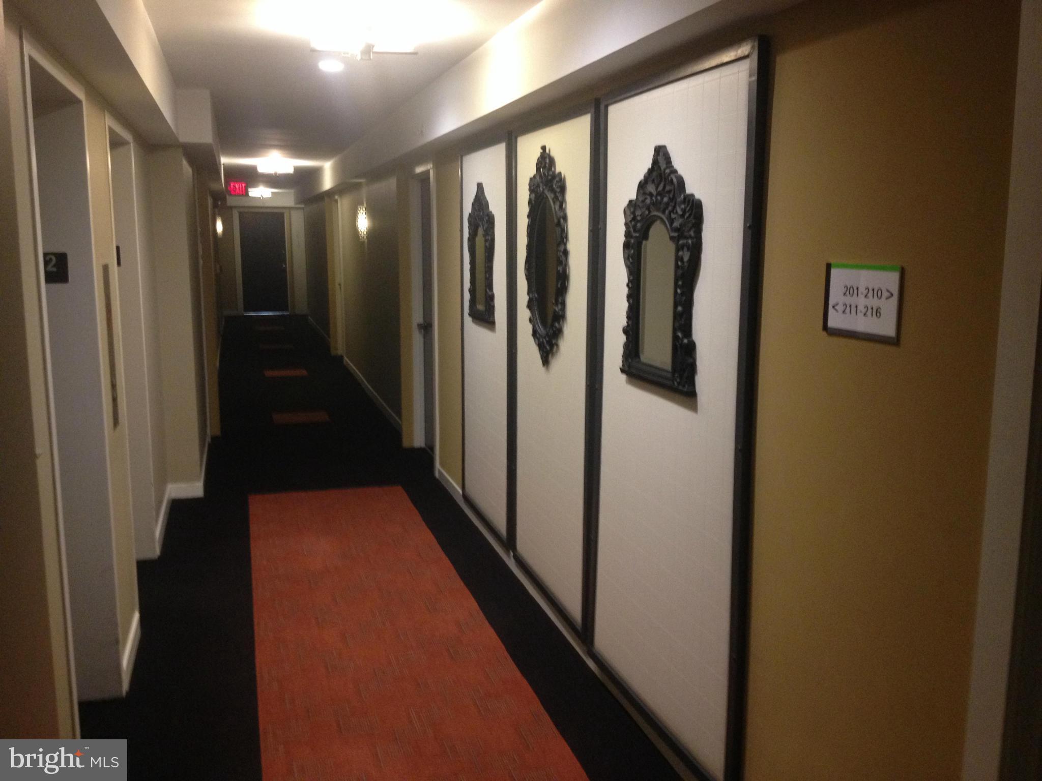 1101 3rd Street Southwest, Unit 210 Washington, DC 20024 - Photo 5 of 28 a view of hallway with stairs