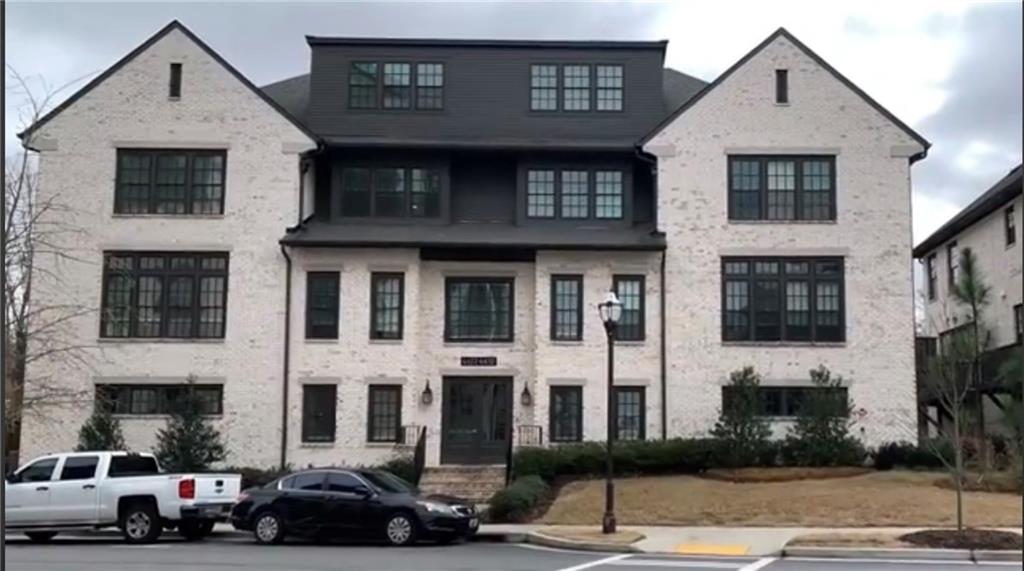 6428 Canopy Drive Sandy Springs, GA 30328 - Photo 1 of 35 a view of a street that has couple of cars parked on the road