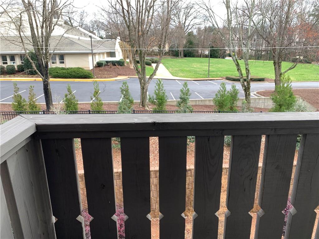 6428 Canopy Drive Sandy Springs, GA 30328 - Photo 16 of 35 a view of a house with a wooden fence