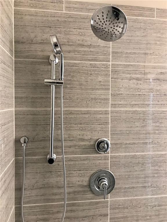 6428 Canopy Drive Sandy Springs, GA 30328 - Photo 21 of 35 a bathroom with a shower