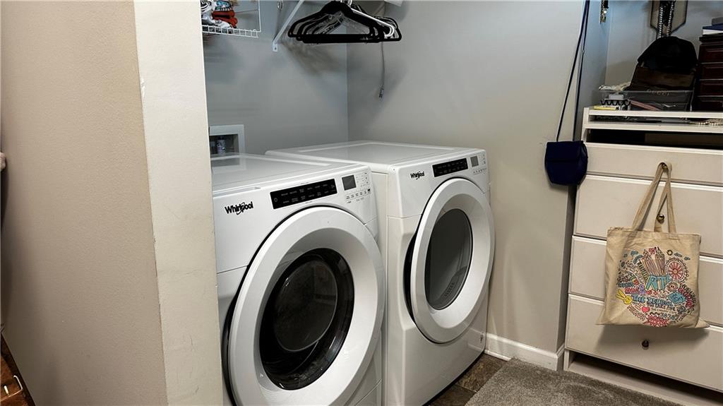 6428 Canopy Drive Sandy Springs, GA 30328 - Photo 22 of 35 a utility room with dryer and washer