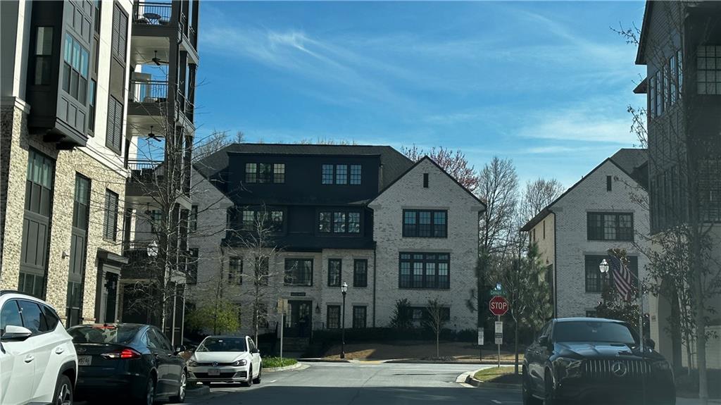 6428 Canopy Drive Sandy Springs, GA 30328 - Photo 27 of 35 a front view of a building with street view