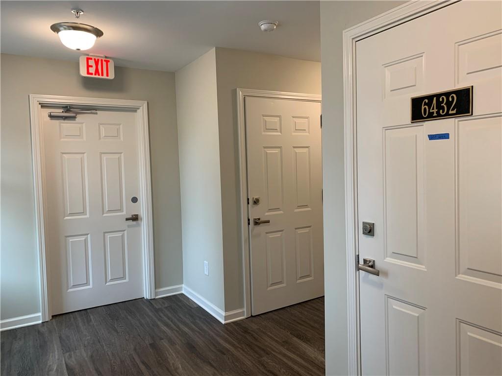 6428 Canopy Drive Sandy Springs, GA 30328 - Photo 5 of 35 a view of a hallway with wooden floor