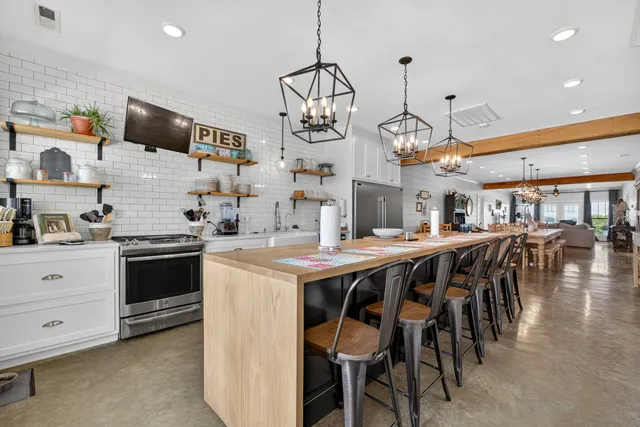 a bedroom with a bed and a mirror