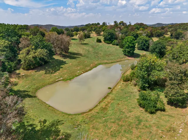 a living room with furniture and flat screen tv