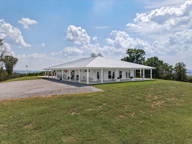 a view of outdoor space with porch and living room