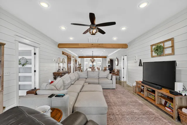 a dining room with furniture and entryway