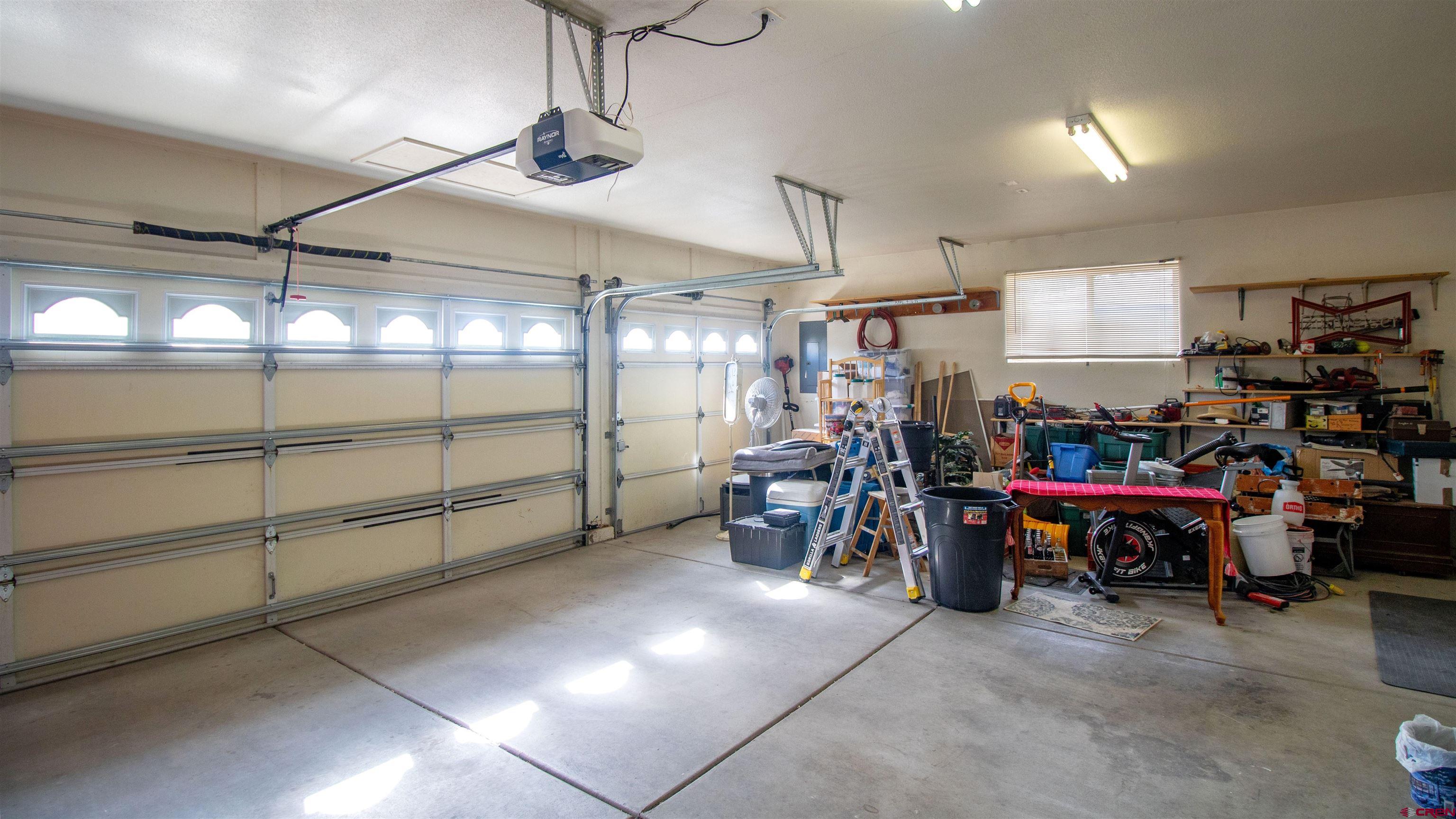 609 Heather Lane Montrose, CO 81401 - Photo 19 of 34 a view of a storage area with a garage