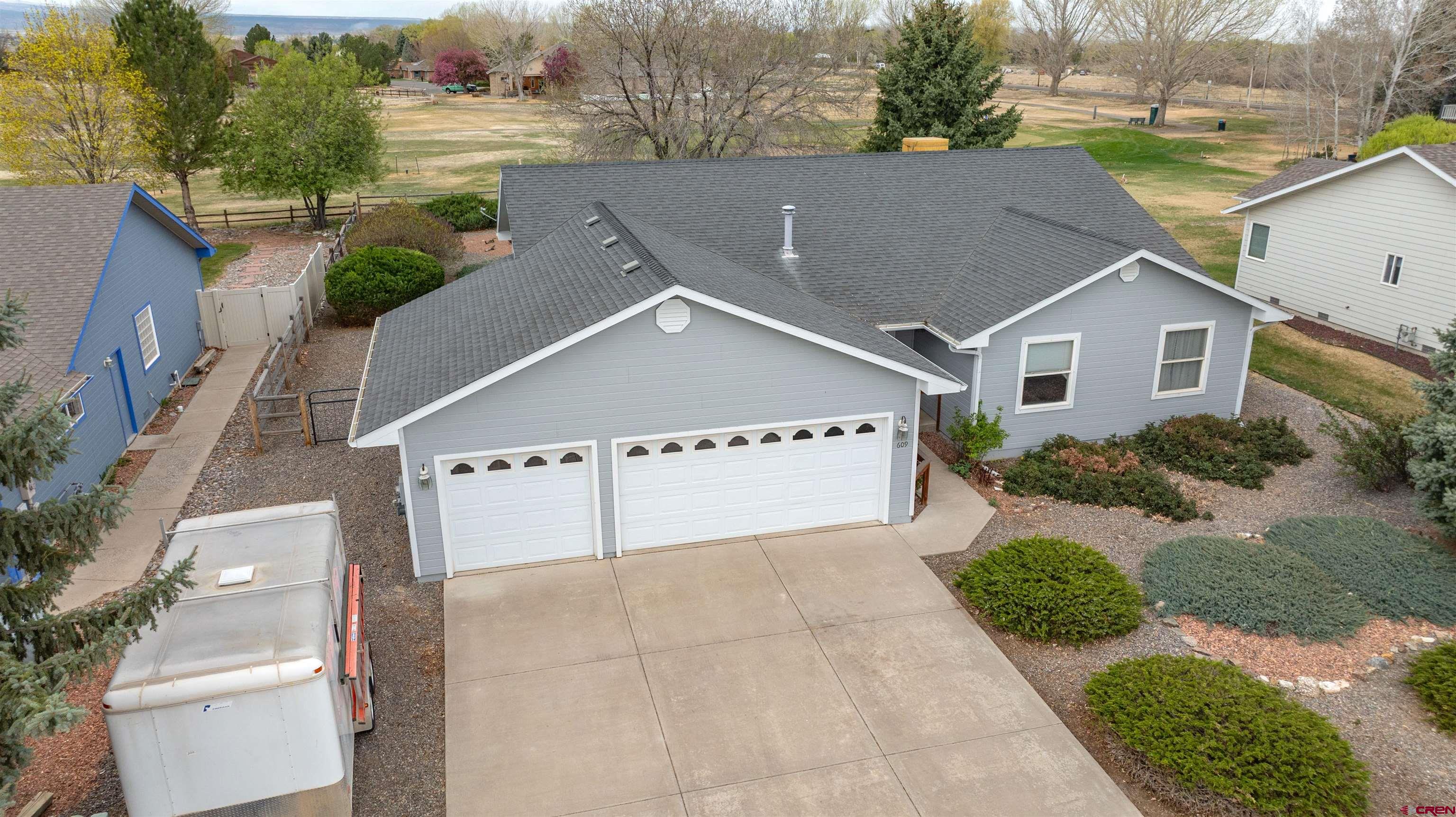 609 Heather Lane Montrose, CO 81401 - Photo 20 of 34 front view of house with a yard