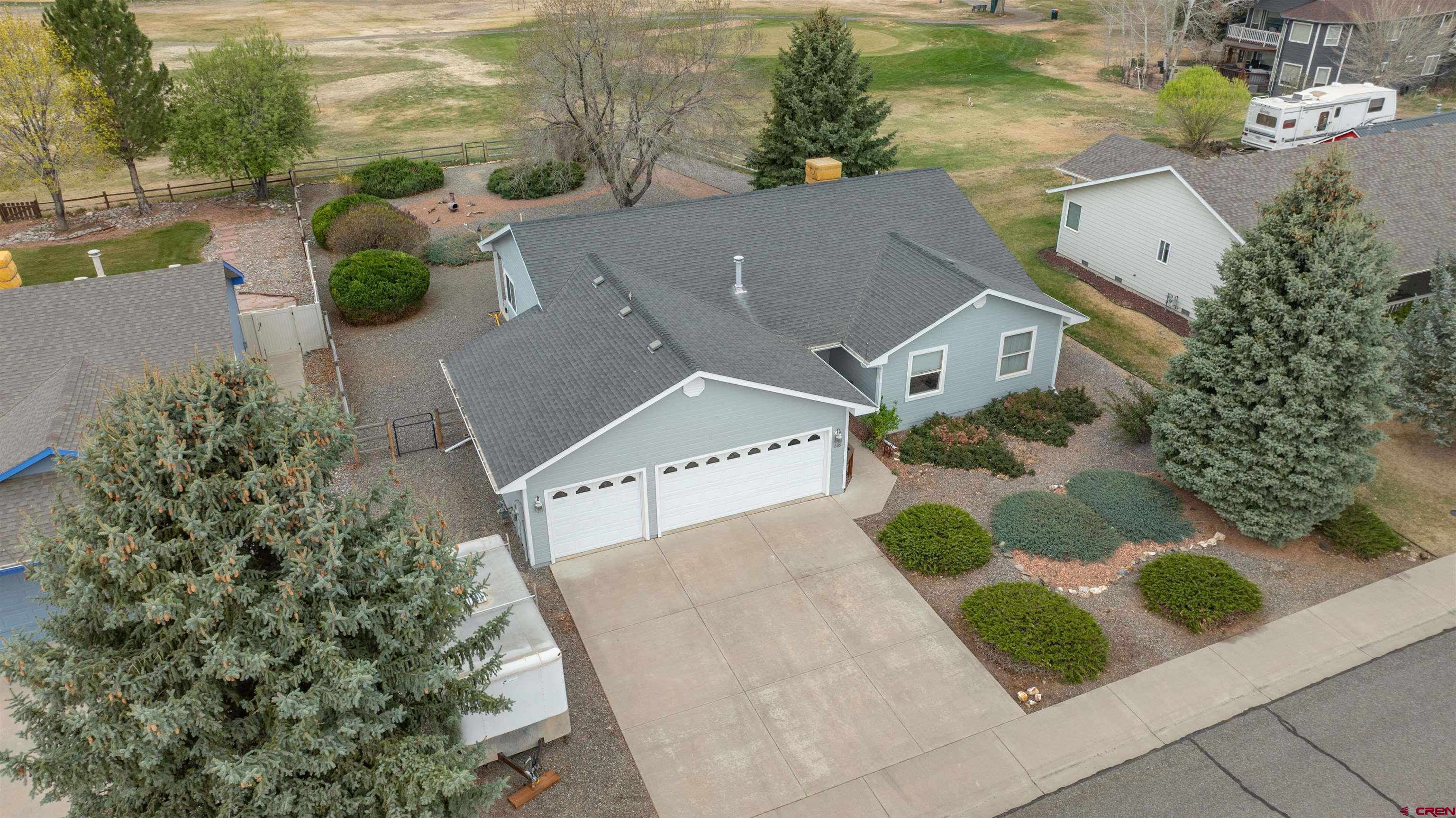 609 Heather Lane Montrose, CO 81401 - Photo 2 of 34 an aerial view of a house with yard