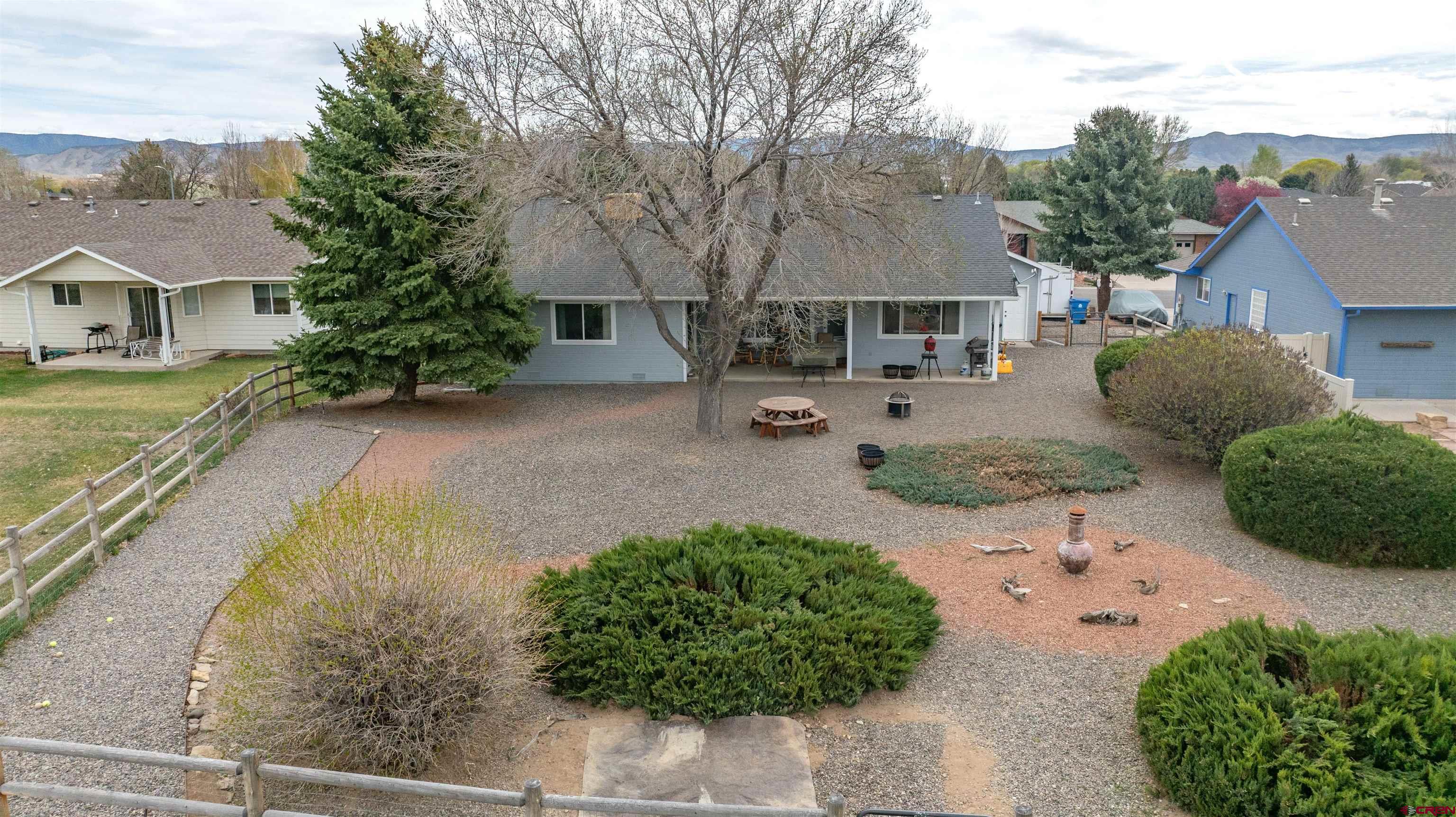 609 Heather Lane Montrose, CO 81401 - Photo 23 of 34 a view of backyard with a garden and entertaining space