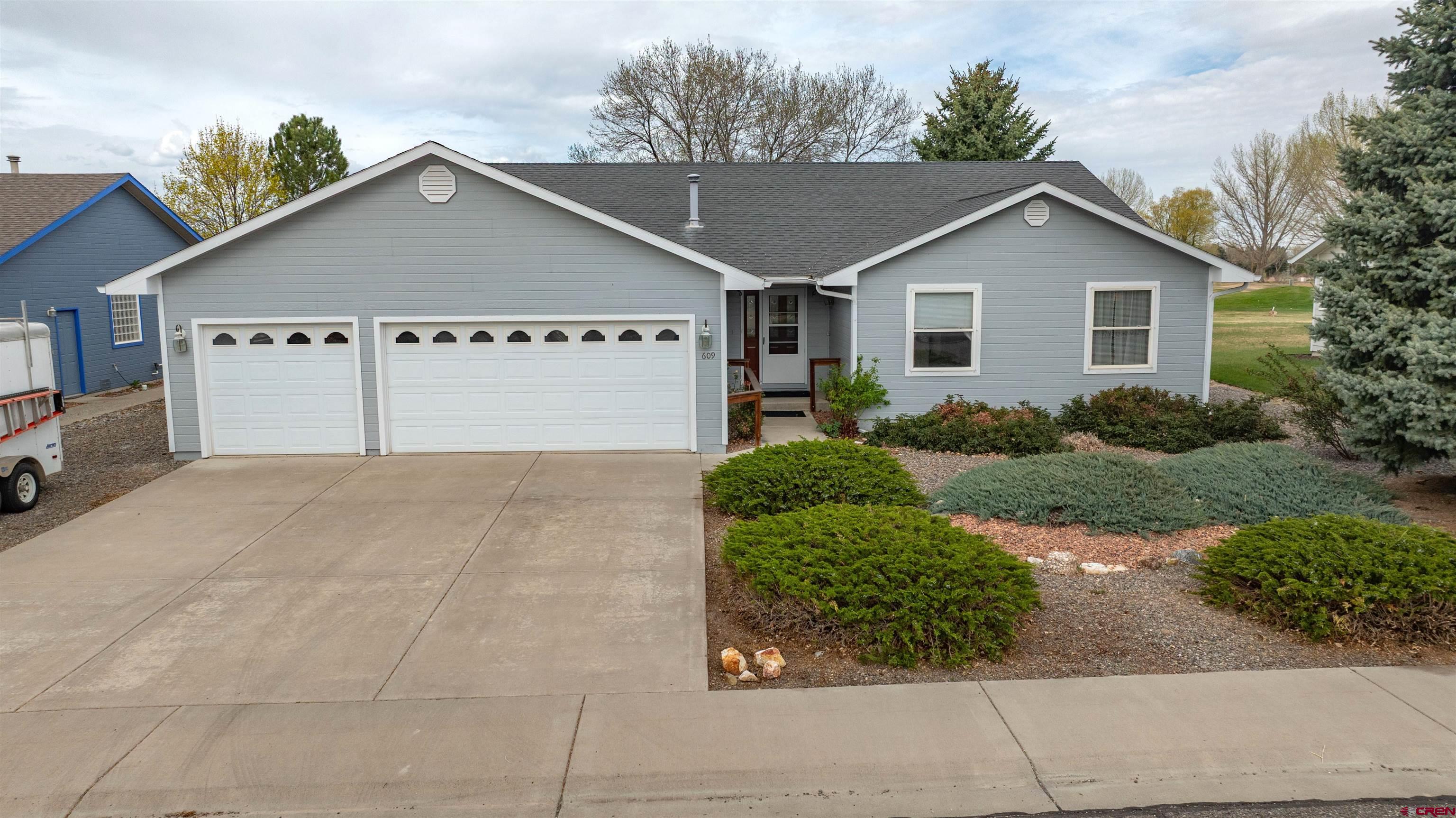 609 Heather Lane Montrose, CO 81401 - Photo 25 of 34 a view of garage and yard